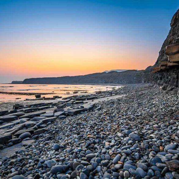 view of cliffs, stones and sea, Jurassic Coast, Dorset, England