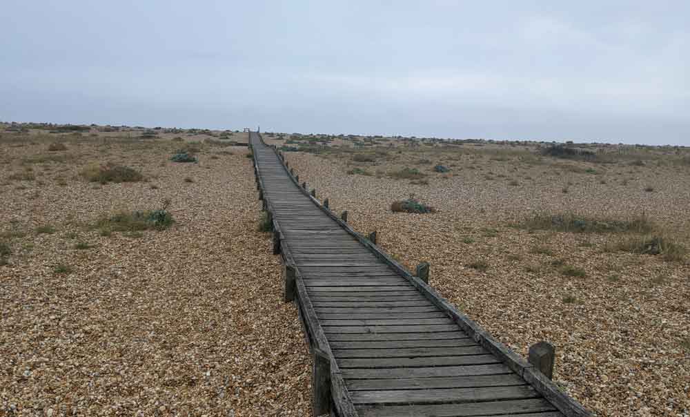 Boardwalk across shingle Beach, Dungeness, Kent, England