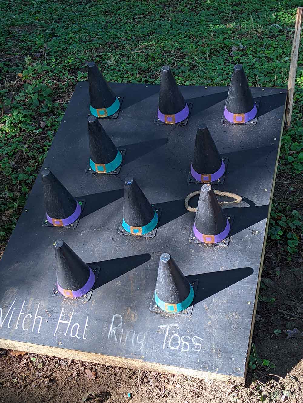 witch hat ring toss game. 10 black cones with ring.