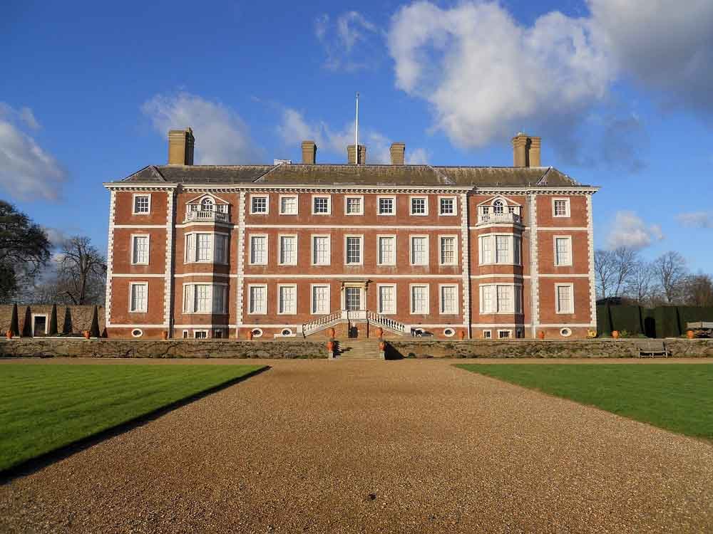 view of Ham House looking up wide gravel driveway, England