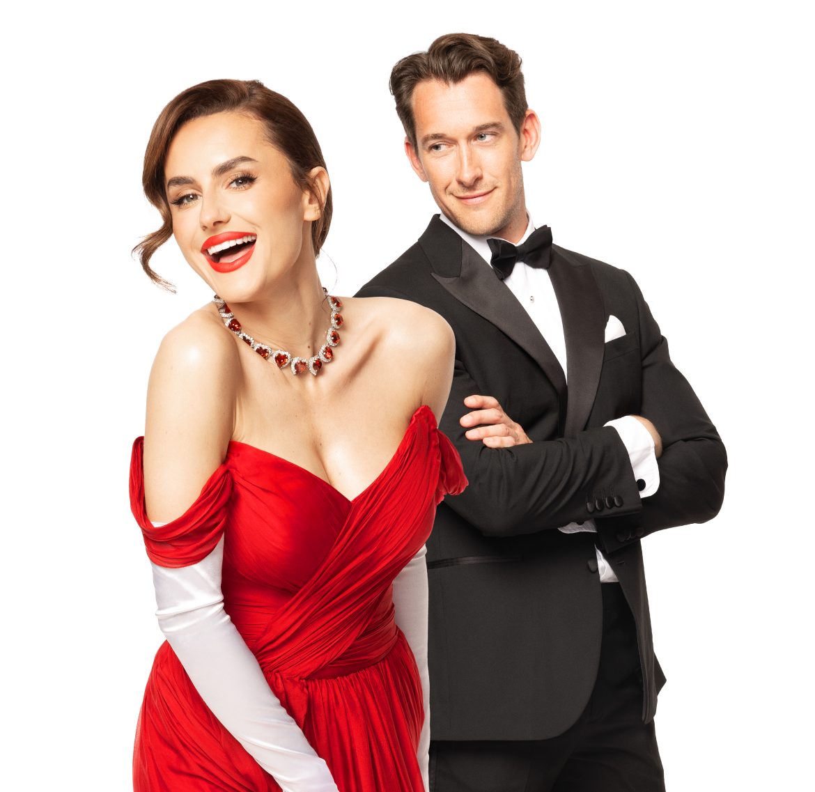 Image of Amber Davies in red dress and long white gloves and Oliver Savile in tuxedo for Pretty Woman