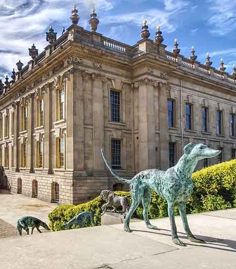 View of Chatsworth House terrace with dog statue, Bakewell, Peak District