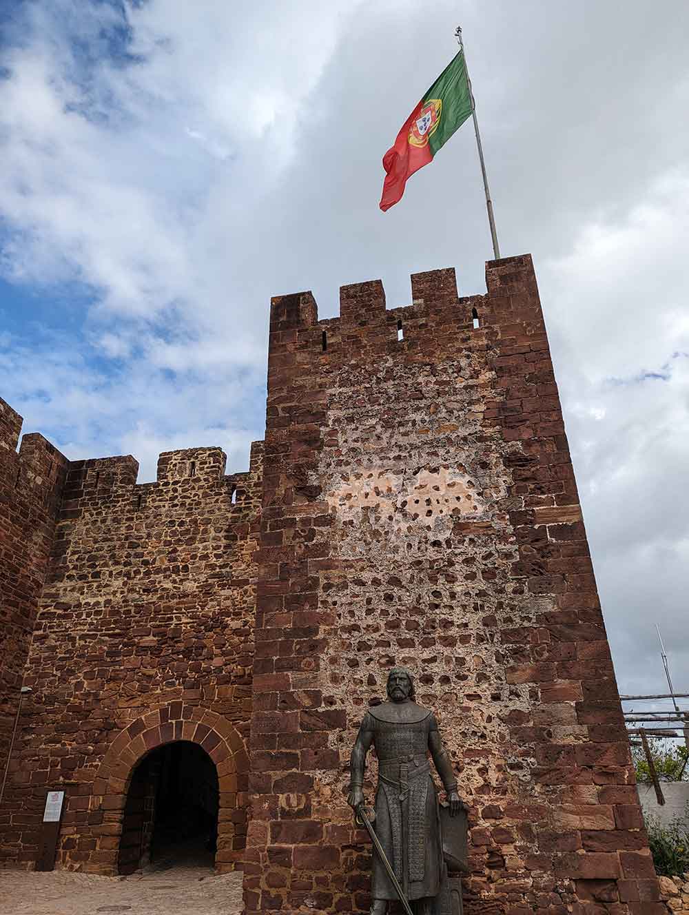 Statue of knight at the gated entrance of Silves Castle, Portugal