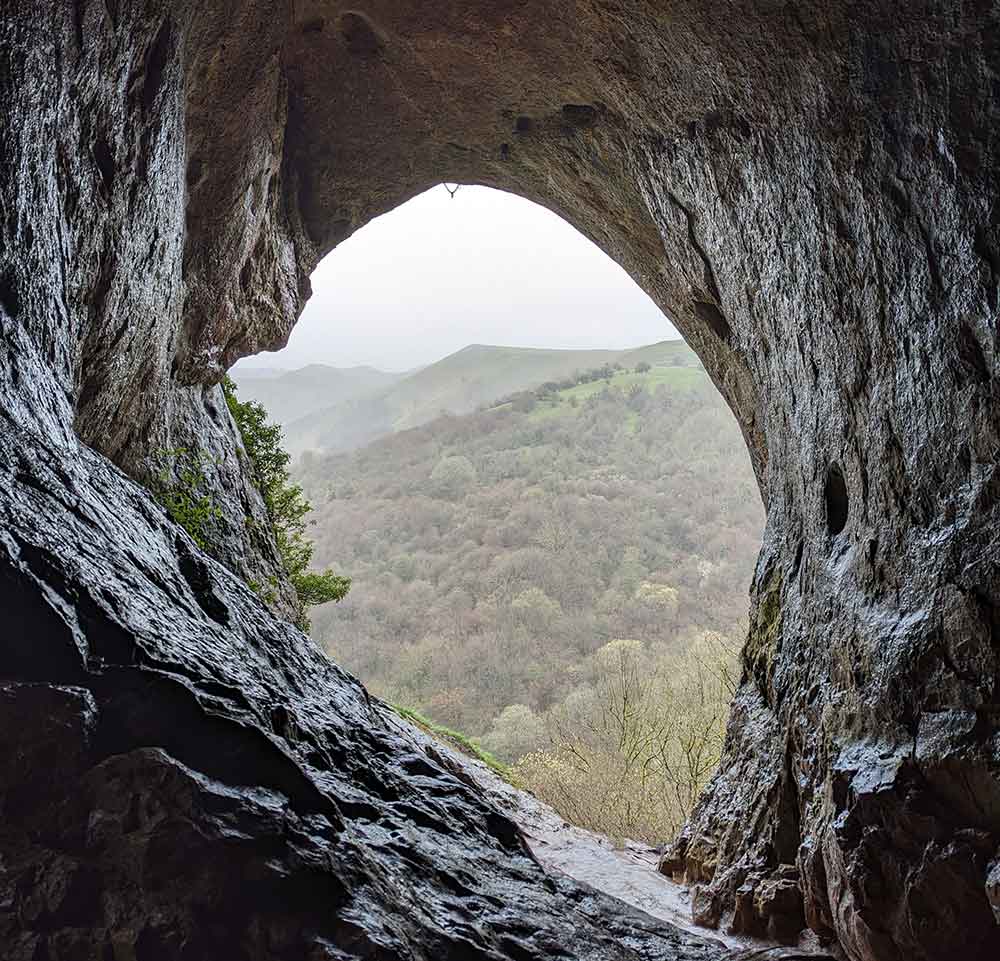 View from inside cave over Manifold valley, Peak District