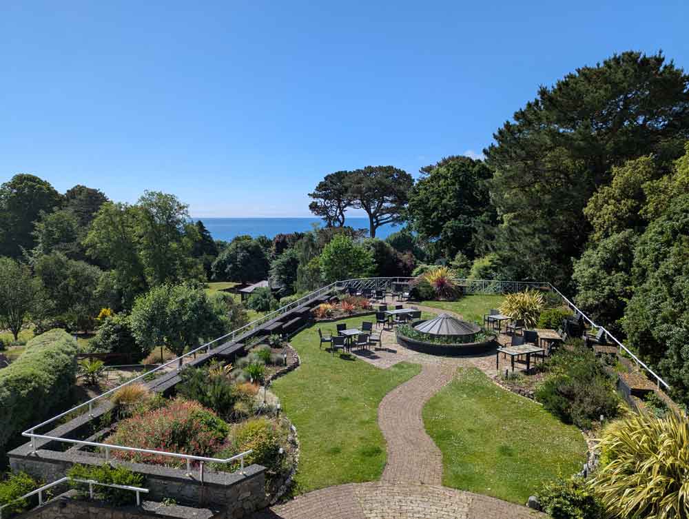 Manicured gardens and trees overlooking the sea at the Teignmouth Sign, Teignmouth, South Devon