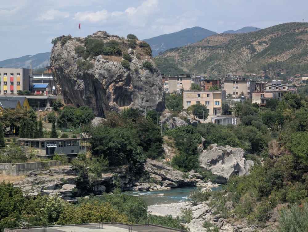The City Stone rising from the Vjosa River Valley in Permet, Albania