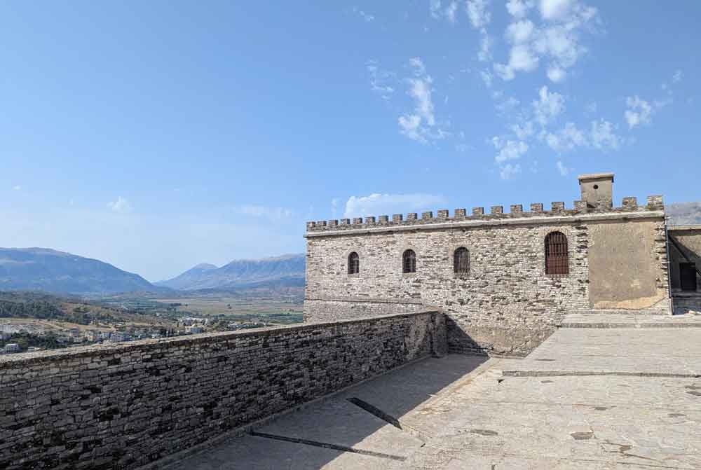 Ramparts at Gjirokaster Castle and mountains in the distance