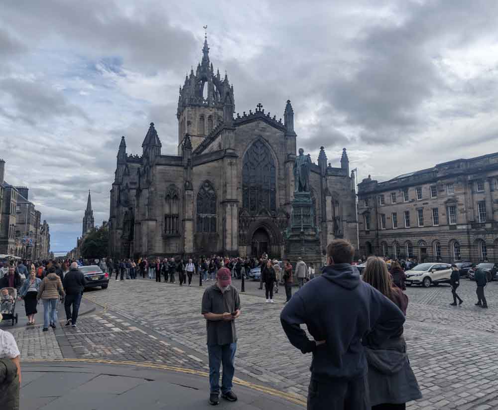 Cathedral with grey skies and lots of tourists